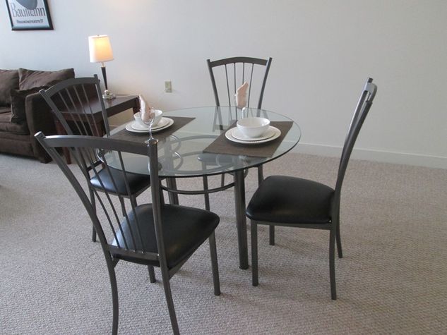 Dining area with seating for four where you can dine in comfort