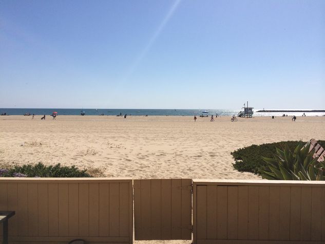 Sweeping beach and ocean views from the private patio or living room