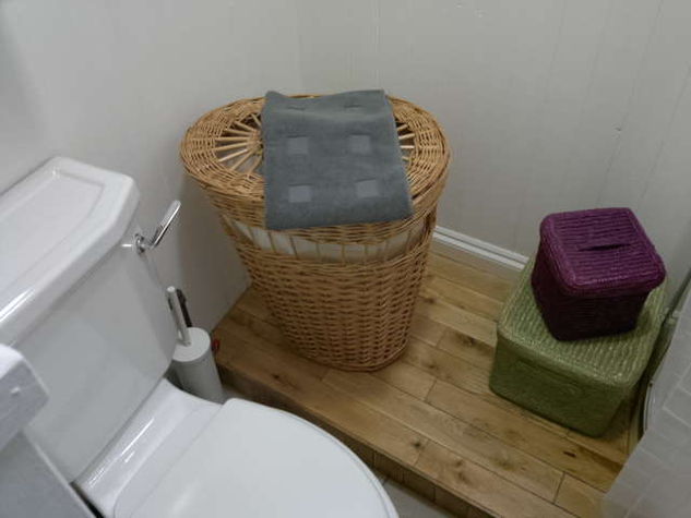 The bathroom is in the traditional style...