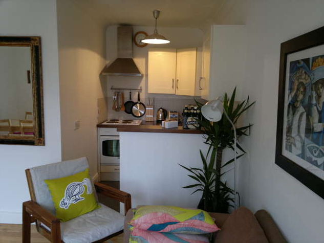 The small but functional kitchen is just off the living room