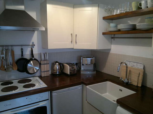 The kitchen is in the traditional Dublin style, with a solid oak countertop and Belfast sink