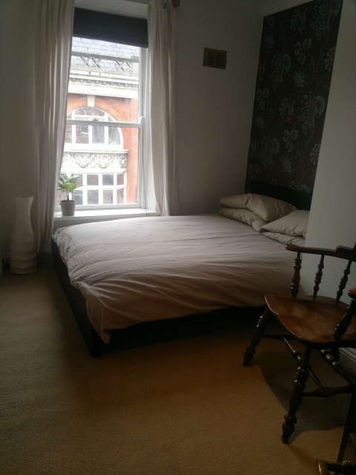 The main bedroom has a double bed...