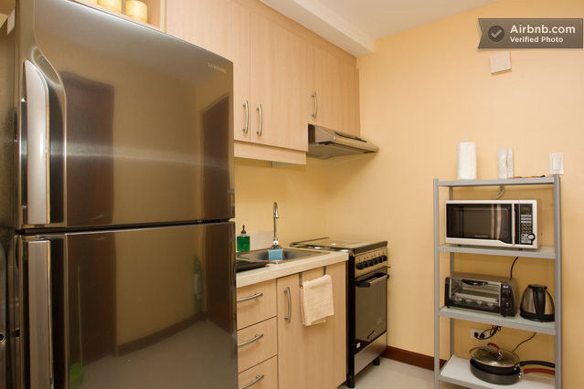 Microwave; oven toaster; stainless steel kettle; coffee maker; Top stove and oven; Refrigerator; Basic kitchen utensils and gadgets