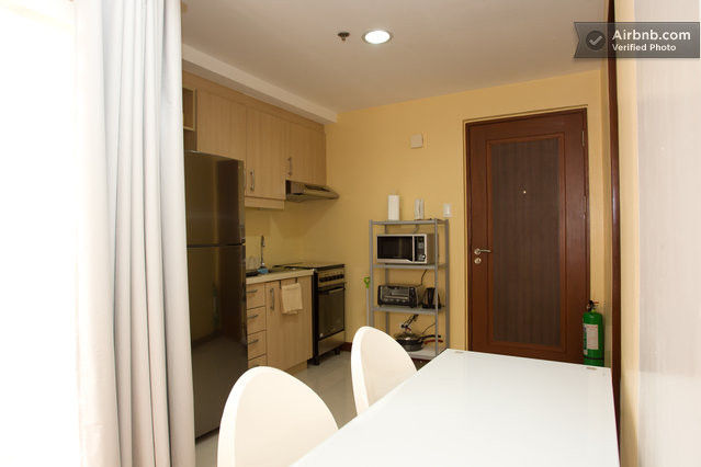 Two dinning chairs and a dining table