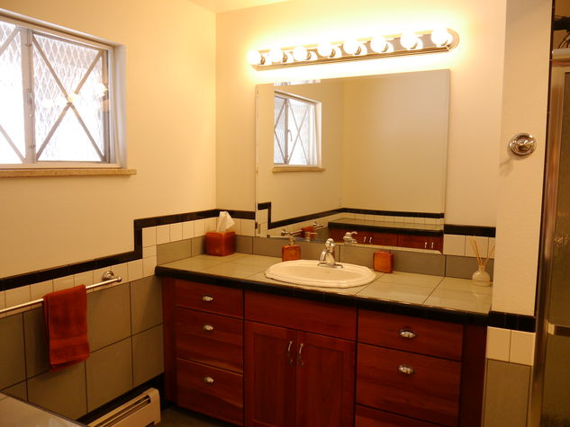 Spacious bathroom with large vanity.
