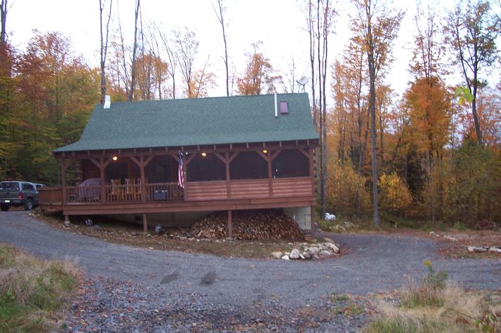View of covered and screen porch