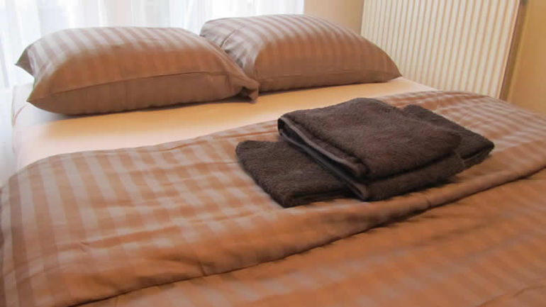 Comfortable double bed, with sheet and towels provided