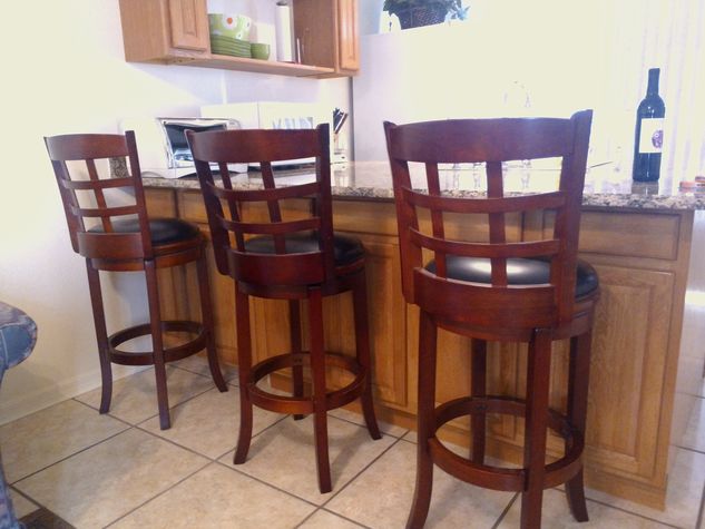 Wook and leather swivel bar stools