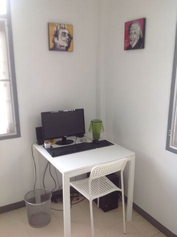Corner working table with computer.