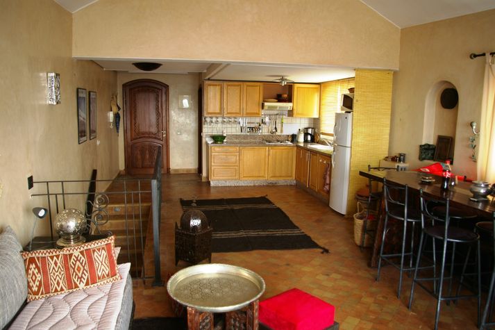 Entrance door getting in to the combined livingroom with american kitchen