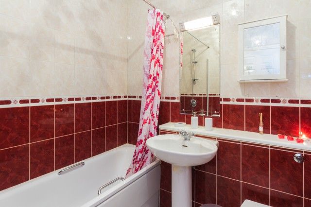 Bathroom with bath tub.
Bathroom with bath tub.