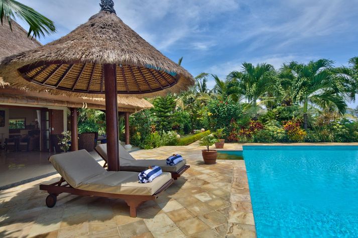 Relax on the sunbeds around the pool