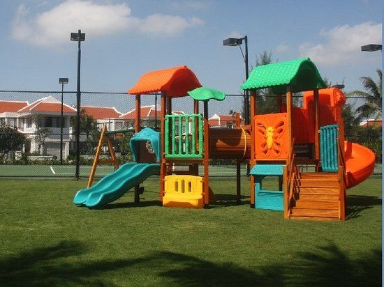 Playground for kids near the pool and beach.