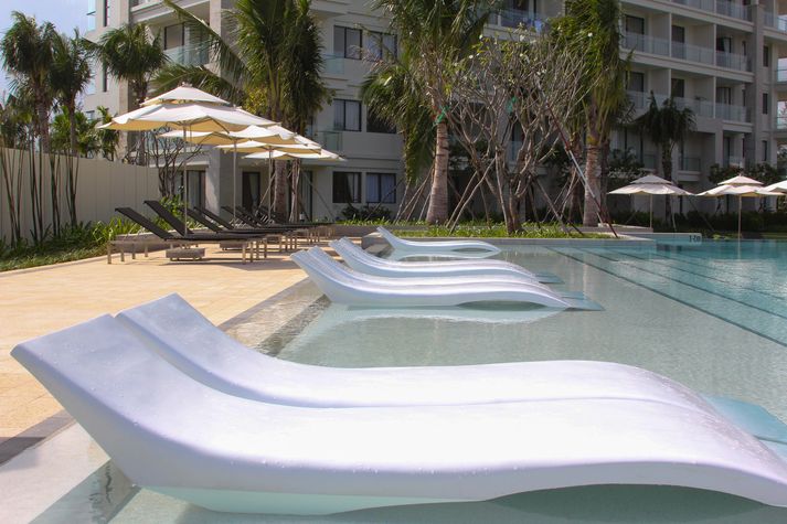 There are relaxation chairs inside the pool, too.