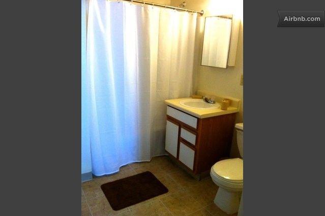 Bathroom with shampoo, soap, and towels