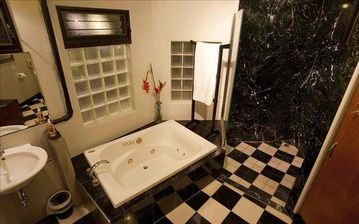 Jacuzzi bath and shower in Master bathroom
