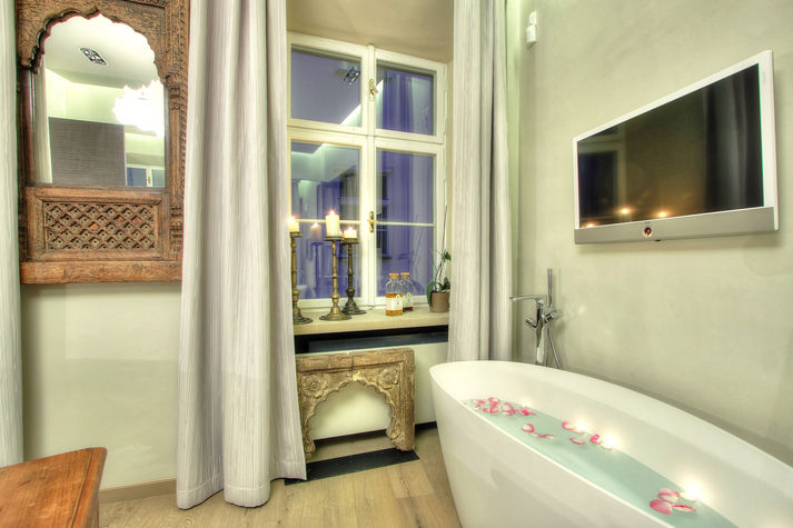bedroom with bath tub