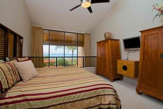 Master bedroom with flat screen TV