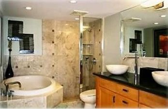 Fully functioning bathroom with two sinks and soaking tub