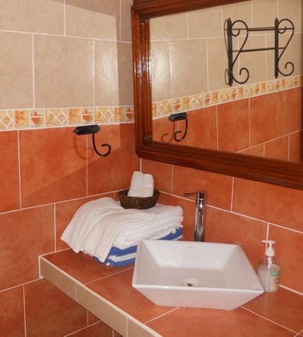 New tile and fixtures in the bathrooms