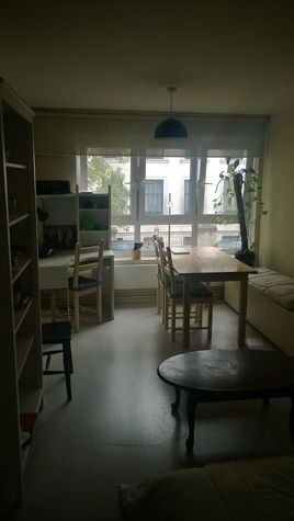 Dining Room with Desk space. Includes printer/scanner. There is also a lovely view on the hotel across the street.