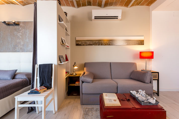 Living area with a double sofa bed