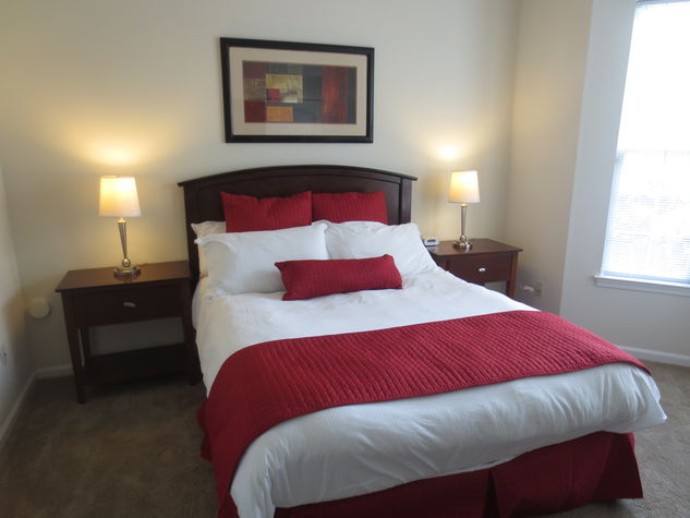 Spacious second bedroom with queen size bed large closet