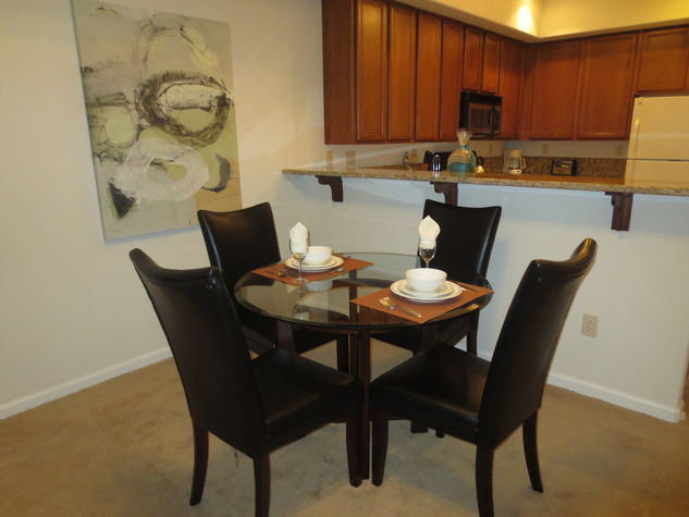 Dining area with seating for four where you can dine in comfort