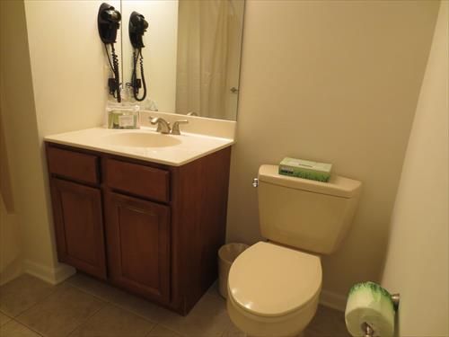 Large bathroom with shower/tub combination; towels and toiletries sample provided