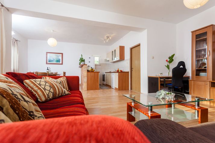 Open space living area with balcony