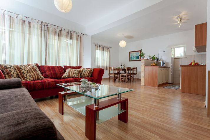 Open space living area with balcony