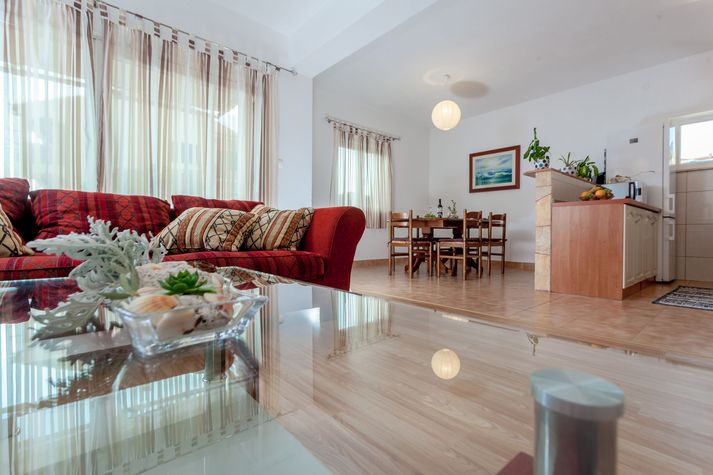 Open space living area with balcony