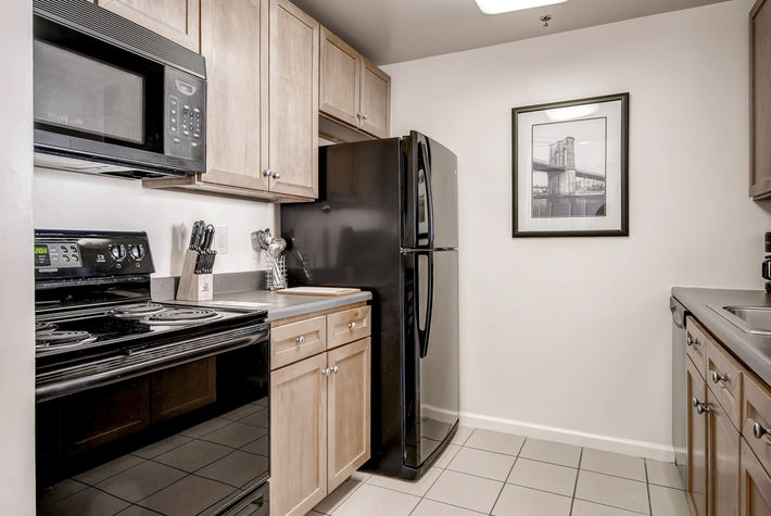Fully equipped kitchen with full size appliances, pots, pans and dishes