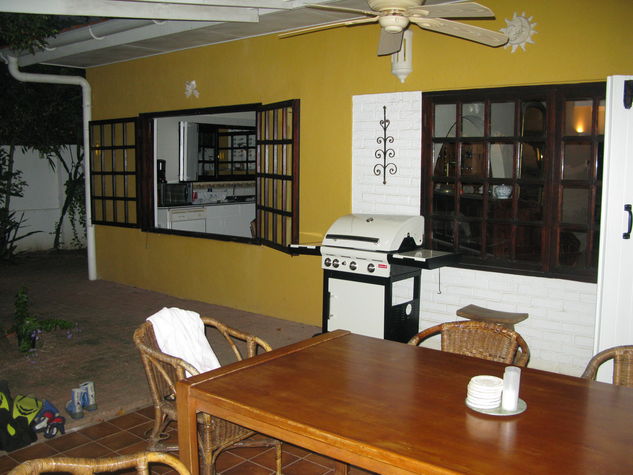 Outside dining area with BBQ.