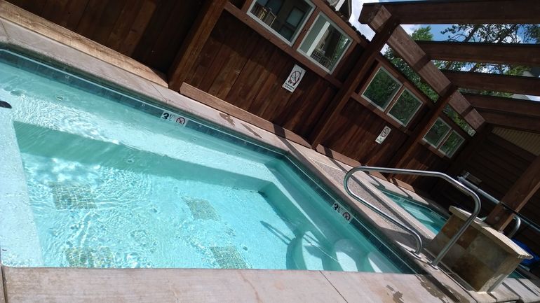Outdoor hot tubs at the New Upper Village pool facility.