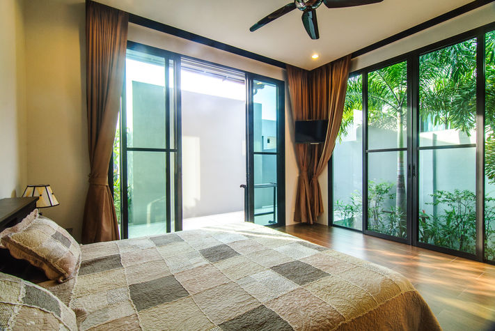 Master bedroom looks onto the pool