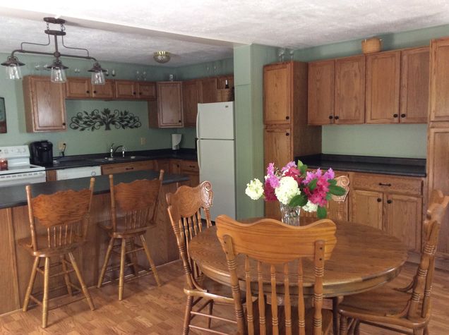 large kitchen dining area. Seating for 8