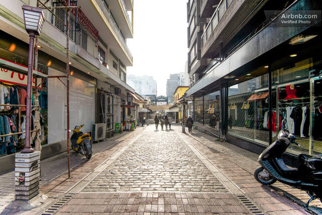 Traditional paved alley under apartment