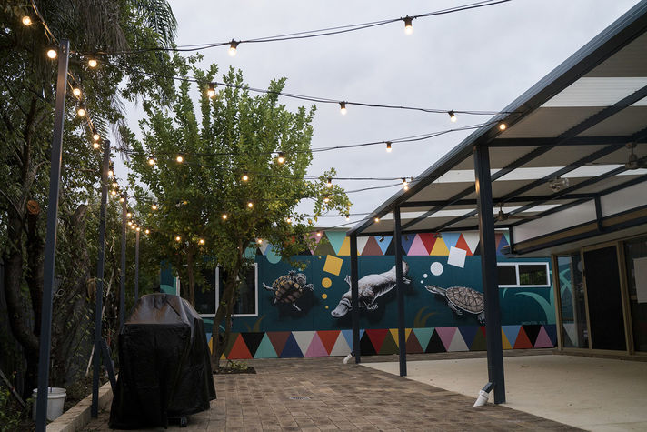 Festoon lights light up the outdoor area very well.