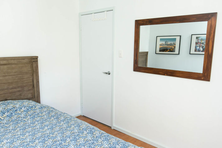 Room 1: Queen Size Bed w/ air conditioning