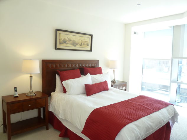 Private bedroom with queen size bed, large closet and floor to ceiling windows