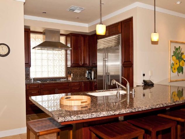 Wolf Grill, Sub Zero Fridge, Granite and Mahogany Kitchen