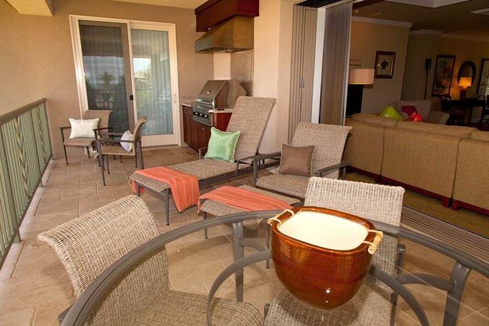 Grill and chill on our comfy Brown and Jordan furniture