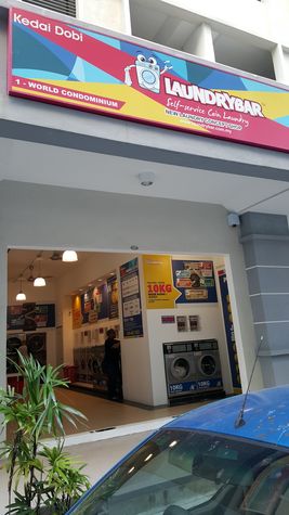 Laundry shop in front of 1 SKY Condo
