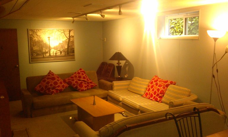 The two beige sofas are hide-a-beds, that could potentially sleep more guests