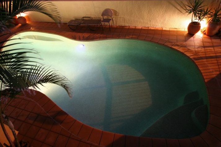 Waterview's heated pool at night