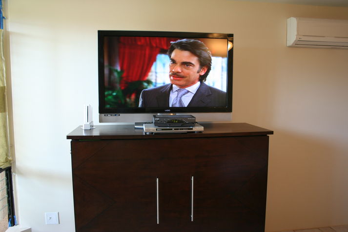 47" LCD HDTV With Cable on top of Double Murphy Bed