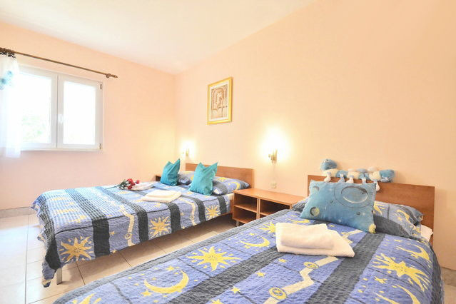 Bedroom with one double and one single