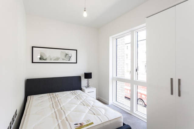 Second bedroom with double bed and large window
Second bedroom with double bed and large window