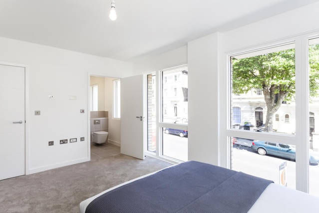 Master bedroom with large window and en-suite bath
Master bedroom with large window and en-suite bath